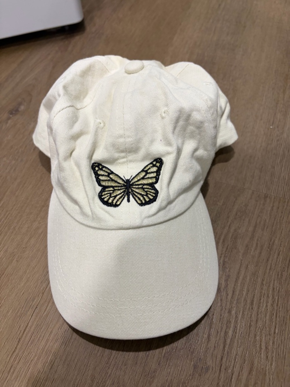 Ivory Baseball Cap with Embroidered Butterfly